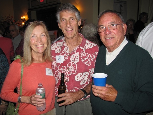 Steve Epstein (center) with his wife and Coach Rich Lapine
